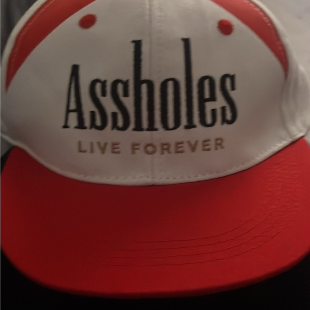Red and White snap back never worn and no longer made